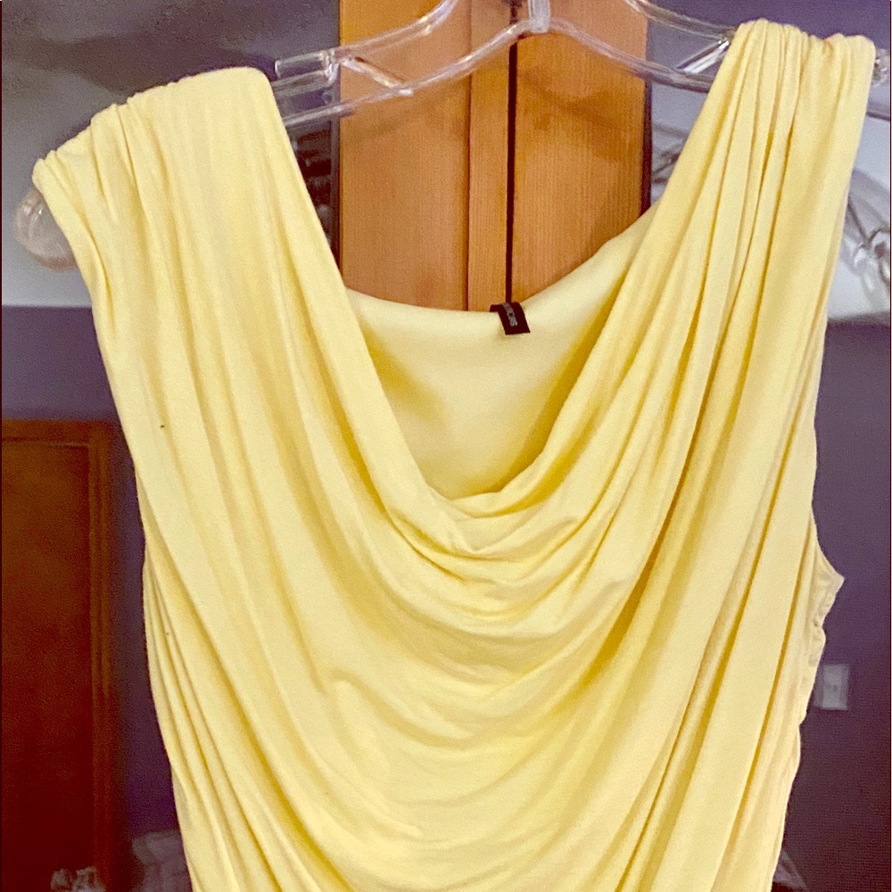 Soft yellow blouse.